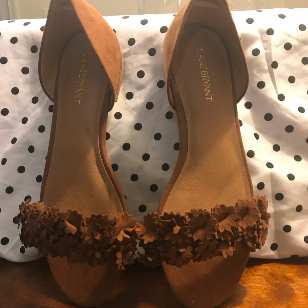 A two-piece open-toe flat in faux suede